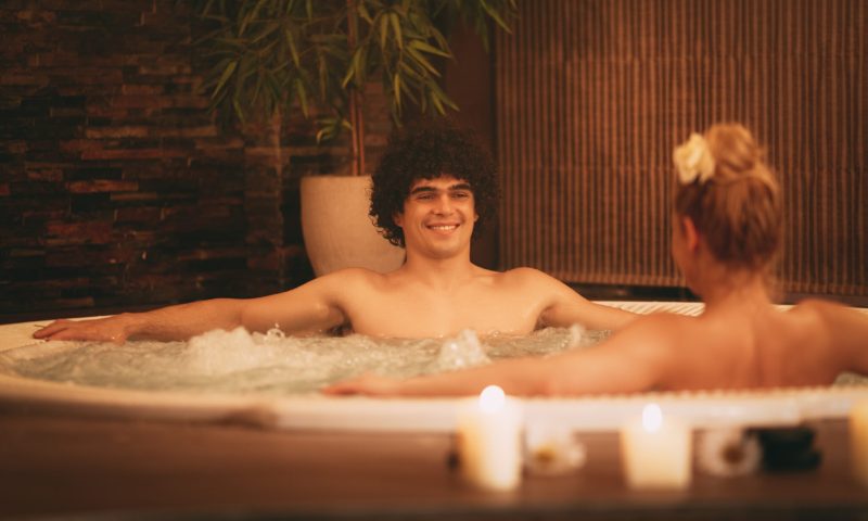 Couple Relaxing In Jacuzzi